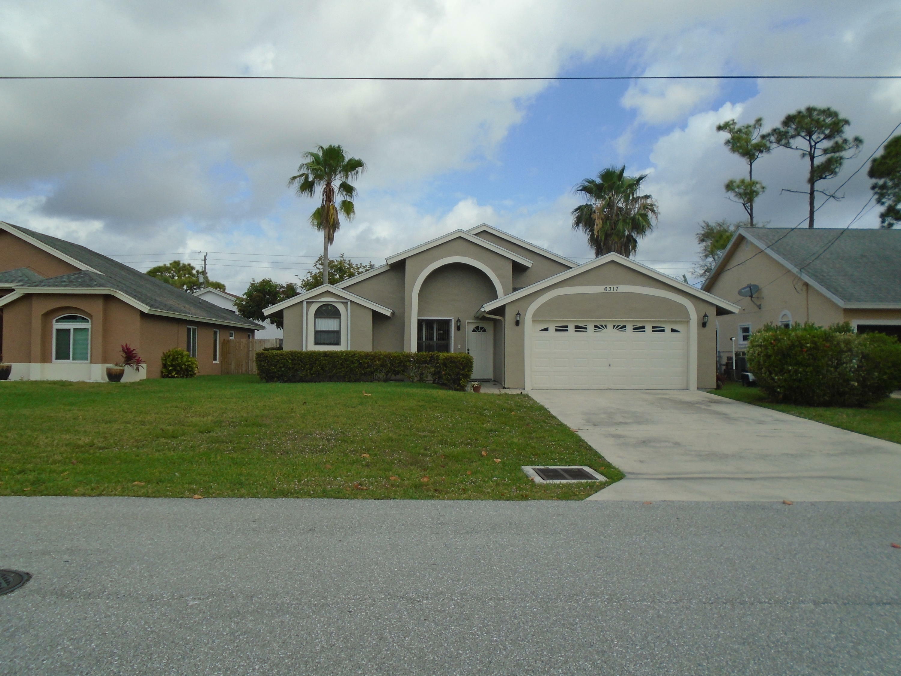 Property Photo:  6317 Robinson Street  FL 33458 