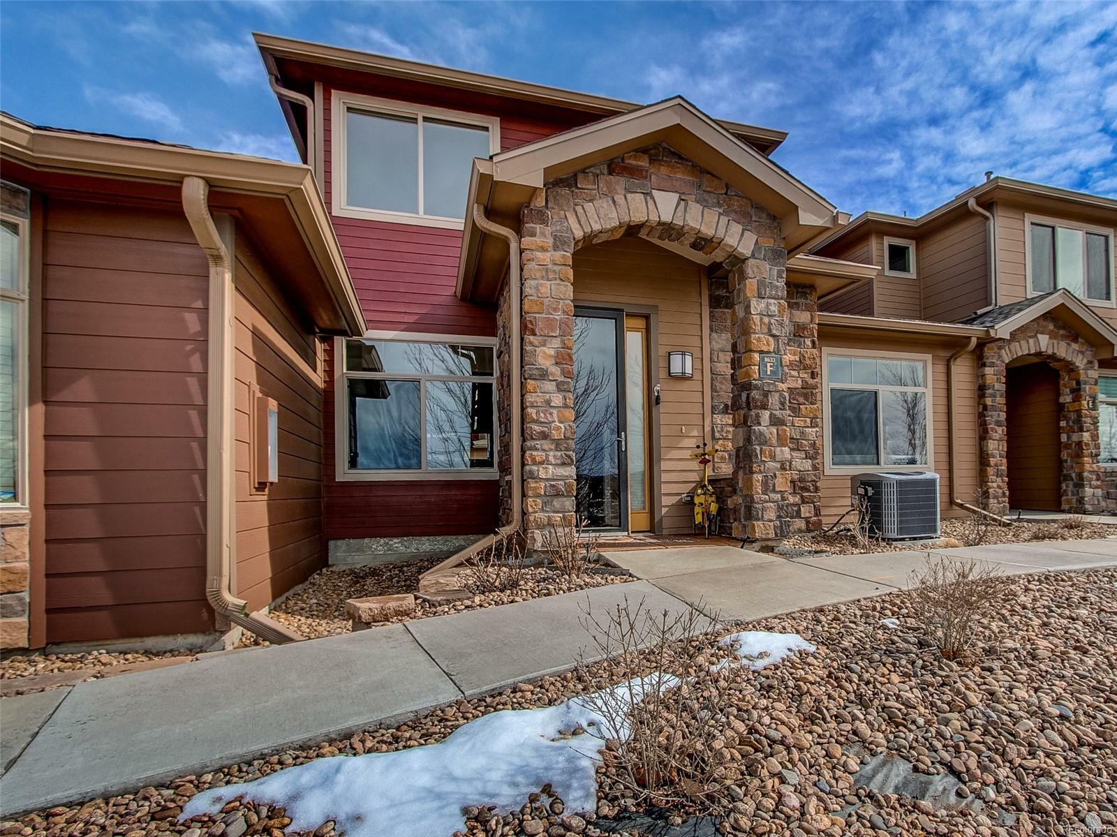 Property Photo:  8633 Gold Peak Place Unit F  CO 80130 