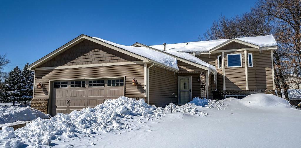 Property Photo: 7102 44th Street N MN 55128