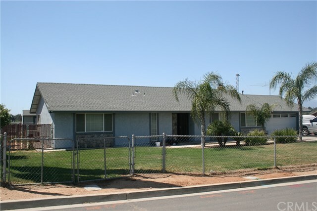 Property Photo:  5755 Hudson Street  CA 92509 