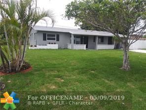 Property Photo: 3001 NE 9th Ave FL 33064