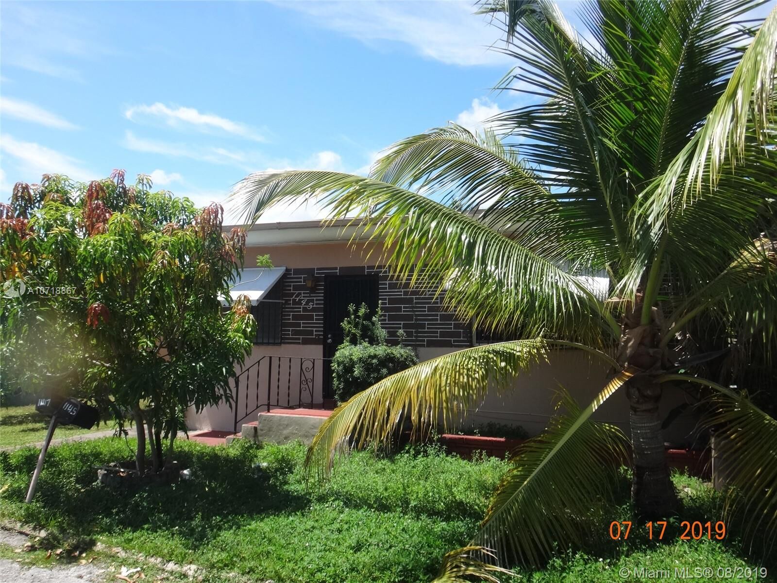 Property Photo: 1145 NE 113th St FL 33161