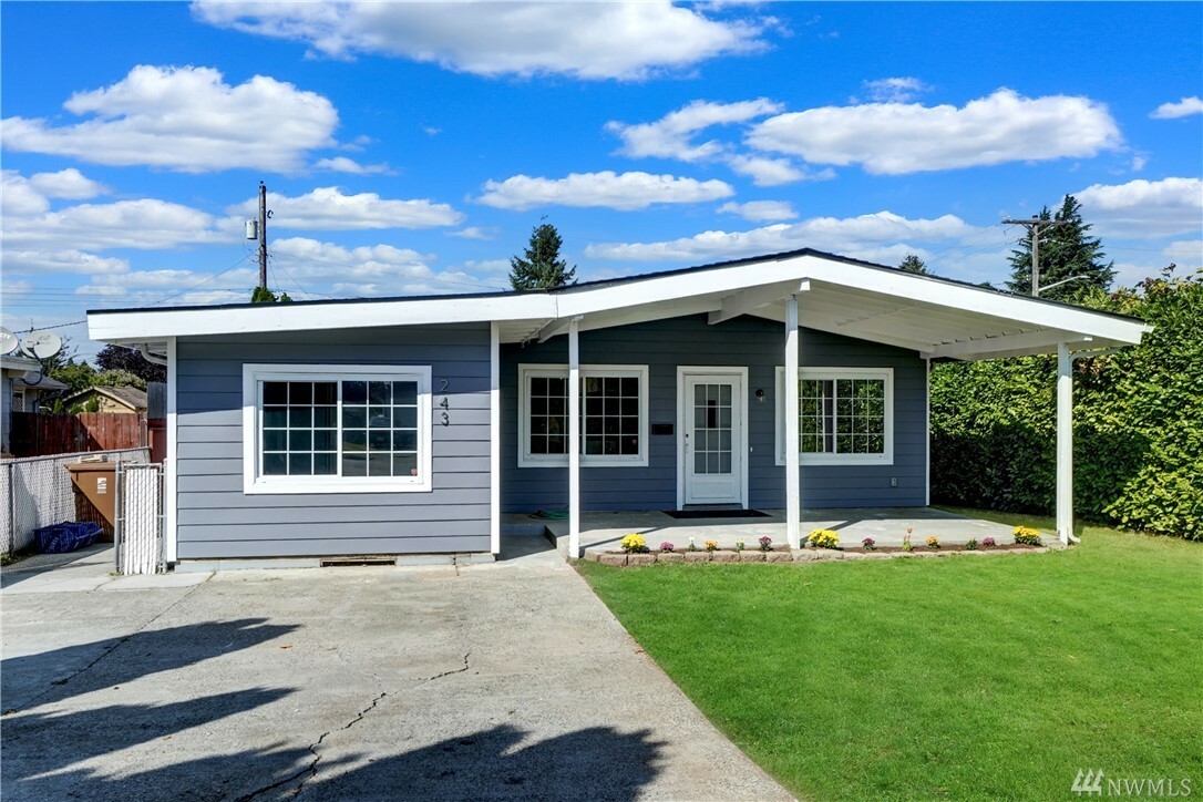 Property Photo:  243 E 61st Street  WA 98404 