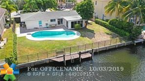 Property Photo:  2301 NE 48th Ct  FL 33064 