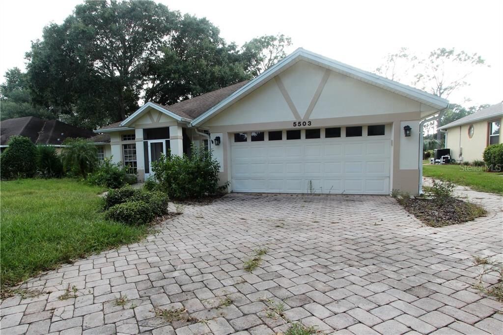 Property Photo:  5503 Grove Manor  FL 32159 