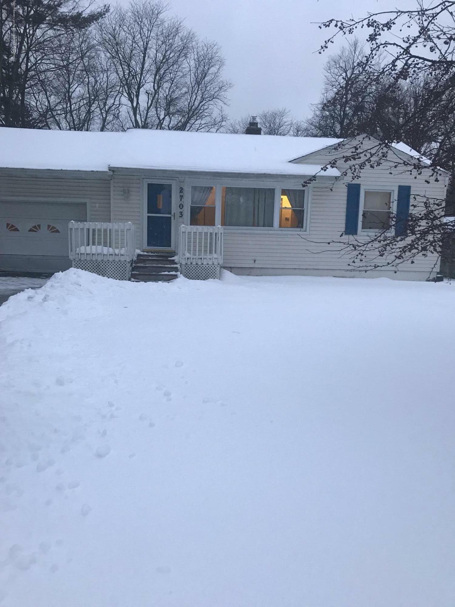 Property Photo:  2703 Westbury Road  MI 48906 