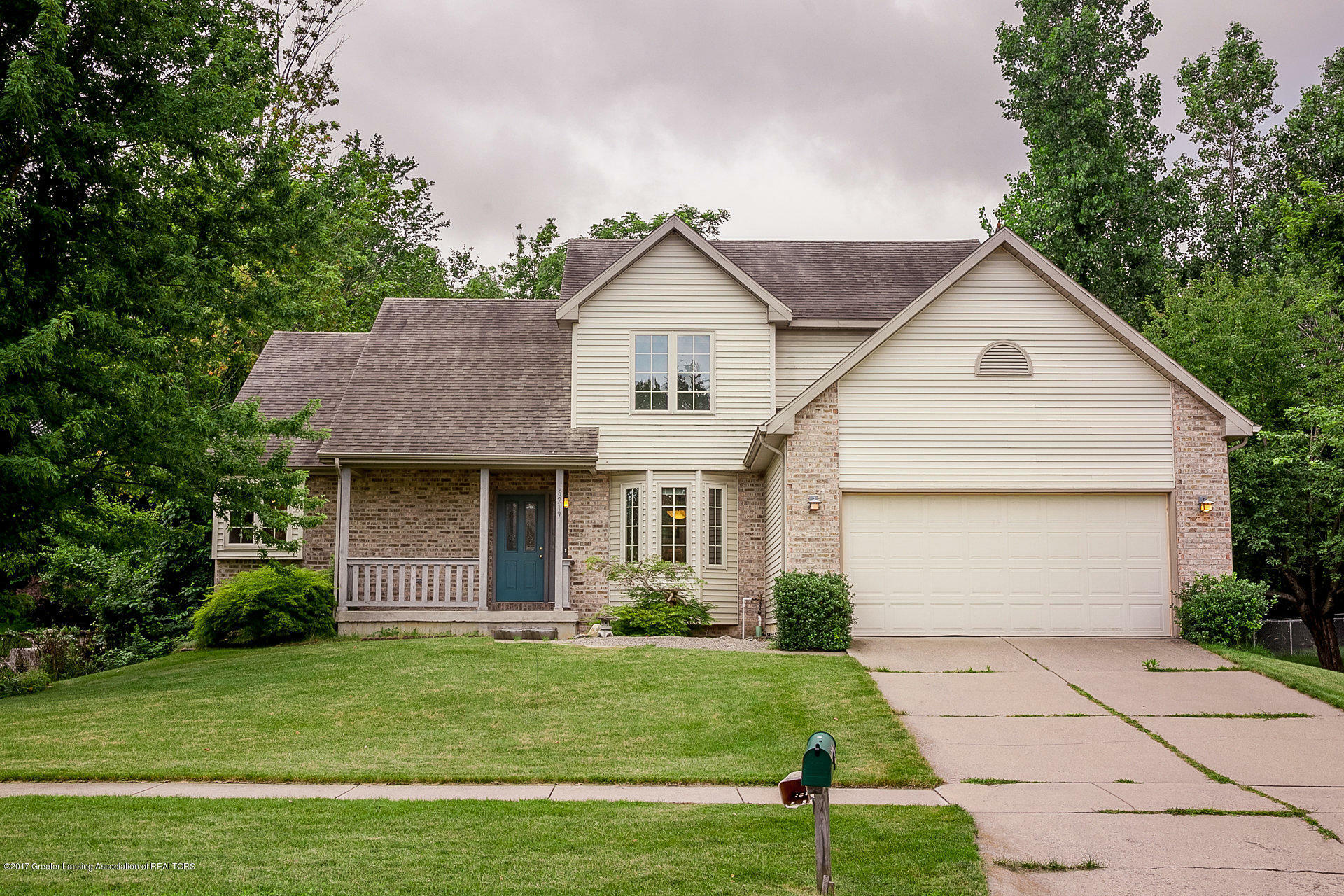 Property Photo:  6219 Windcharme Avenue  MI 48917 