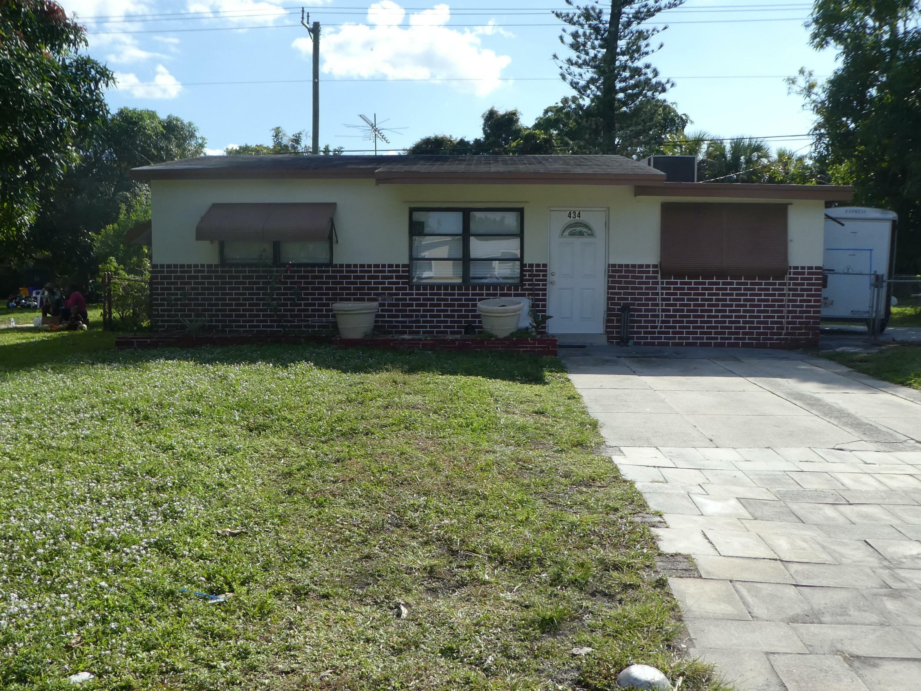 Property Photo:  434 NE 20th Avenue  FL 33435 