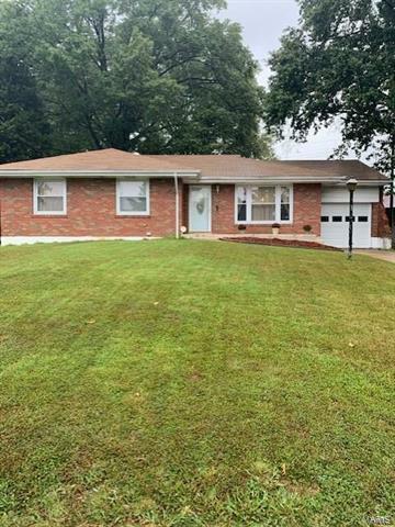 Property Photo:  1109 Bluegrass   63137 