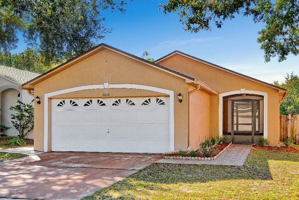 Property Photo:  8828 Valencia Oaks Court  FL 32825 