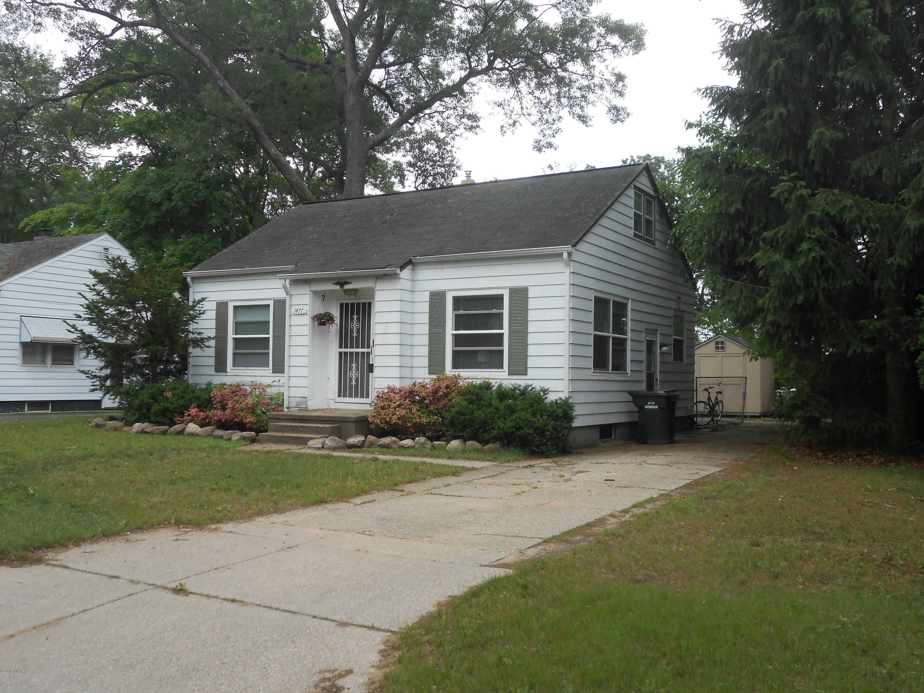 Property Photo:  1477 Montague Avenue  MI 49441 