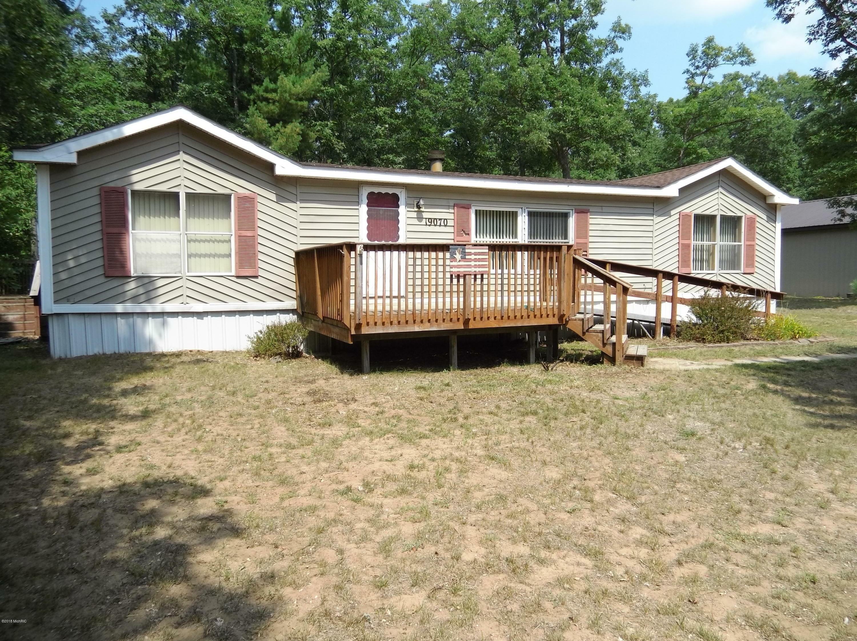 Property Photo:  19070 12 Mile Rd  MI 49644 