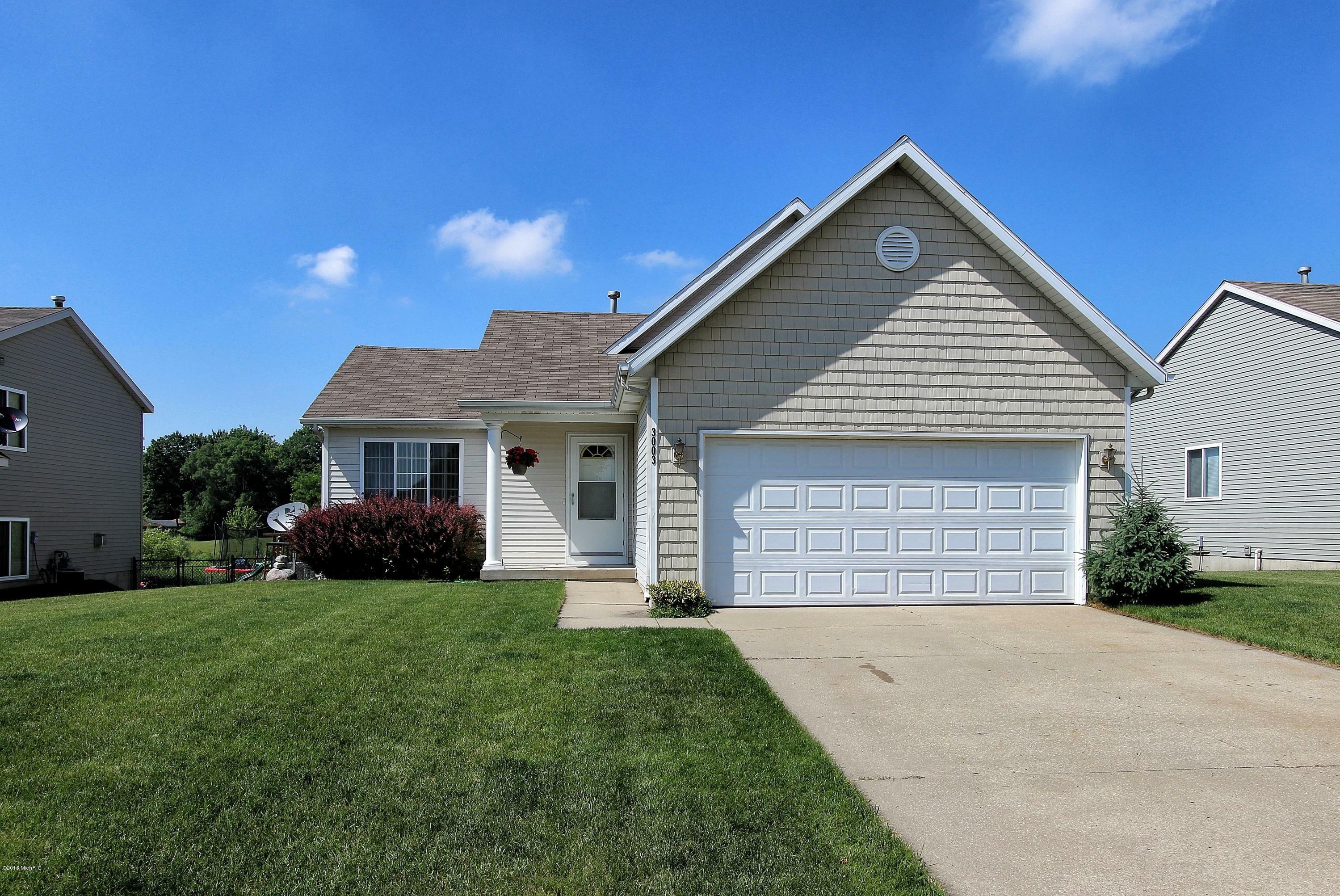 Property Photo:  3003 Woodglen Street NW  MI 49504 