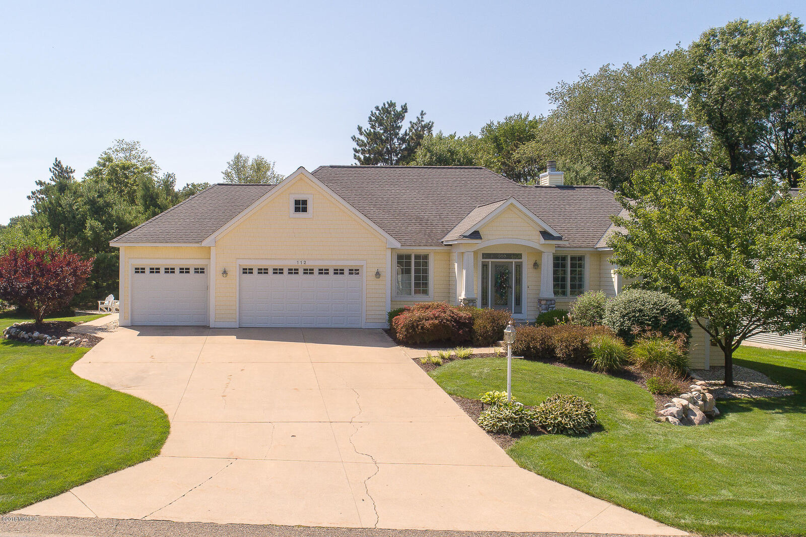 Property Photo:  112 Crosswind Drive  MI 49424 