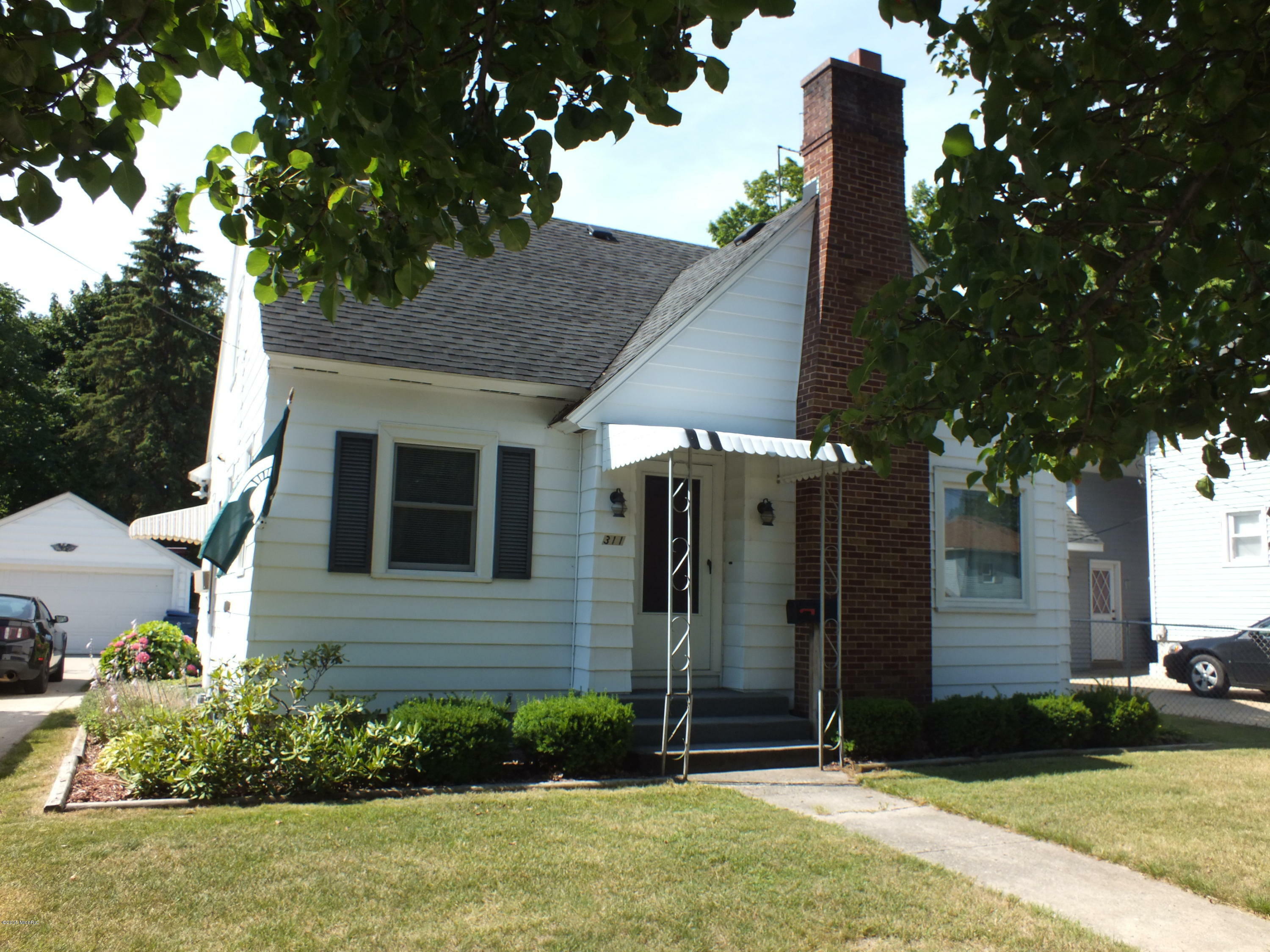 Property Photo:  311 E Jefferson Street  MI 49420 