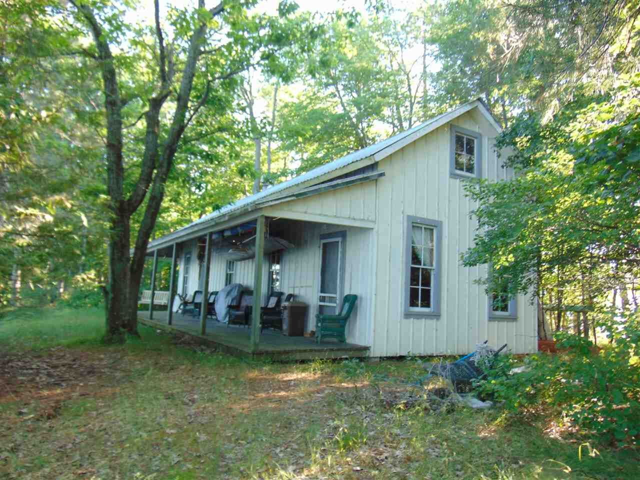 Property Photo:  7912 Pells Island Dr.  MI 49769 