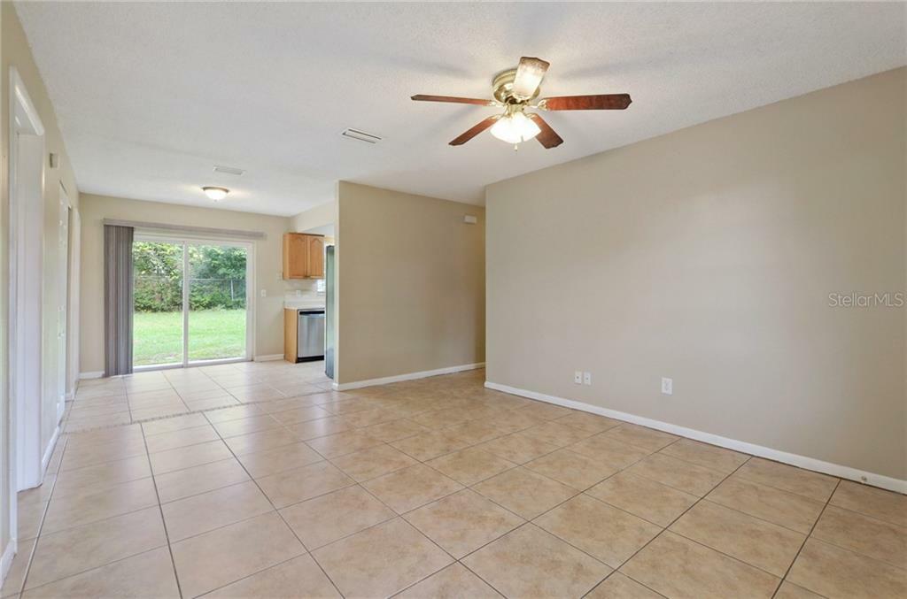 Property Photo:  10108 Alambra Avenue  FL 33619 