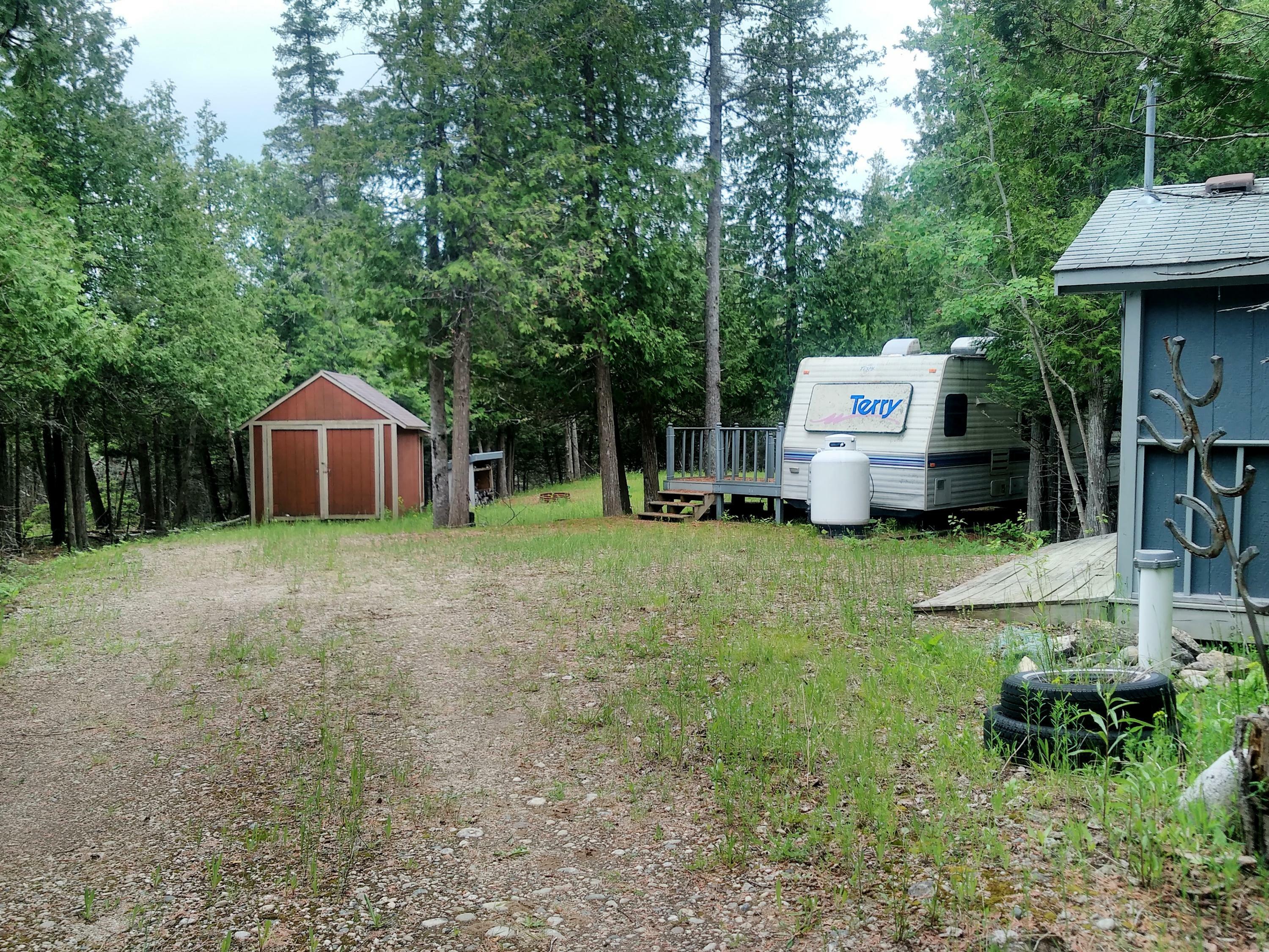 Property Photo:  3369 M-134 Hwy  MI 49745 