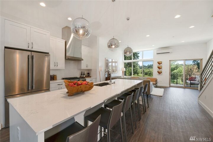 Property Photo:  18252  73rd Avenue NE 103  WA 98028 