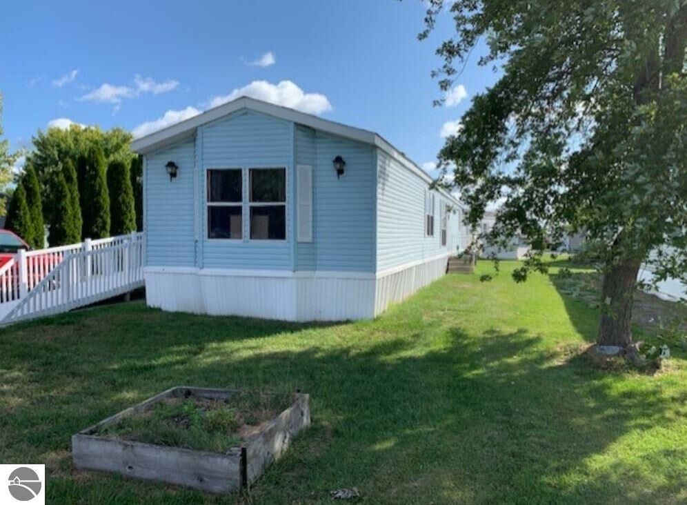 Property Photo:  7344 Lassie Drive  MI 48801 