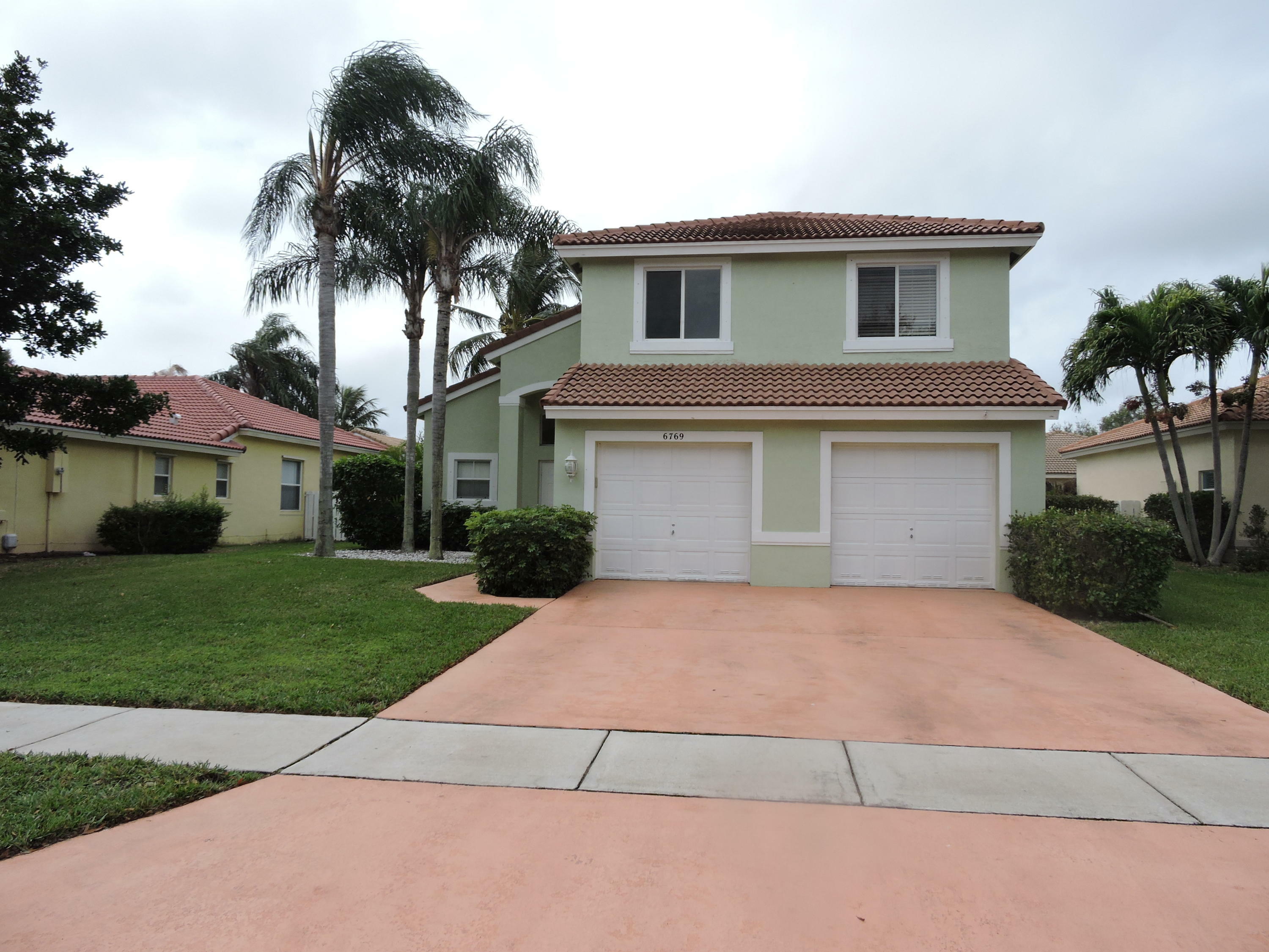 Property Photo:  6769 Las Colinas Street  FL 33463 