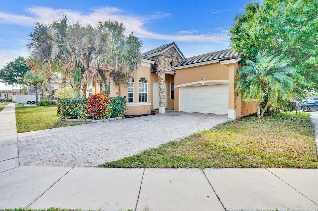 Property Photo:  6864 Spider Lily Lane  FL 33462 