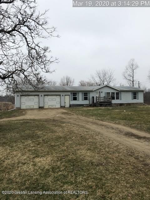 Property Photo:  10560 Woodbury Road  MI 48848 