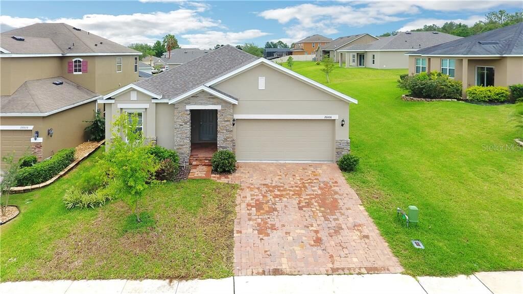 Property Photo: 26006 Meadow Breeze Lane FL 34748