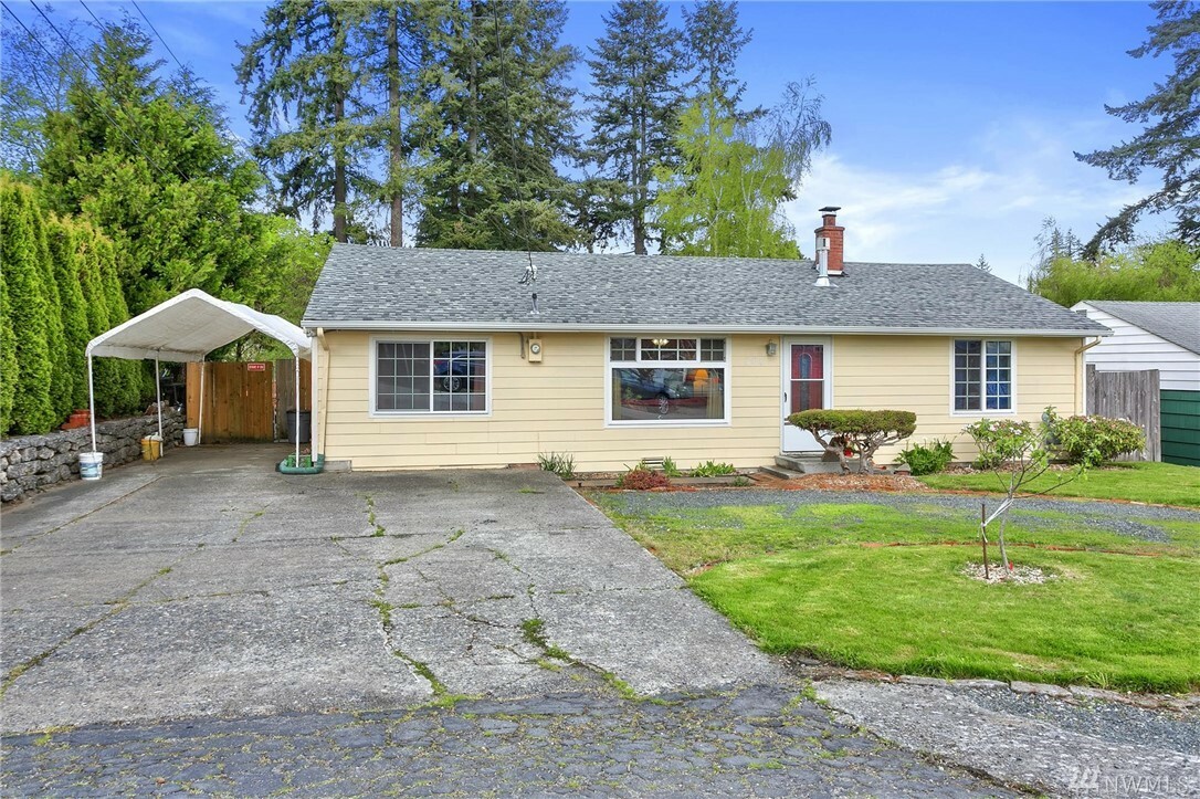 Property Photo:  505 61st St SE  WA 98203 