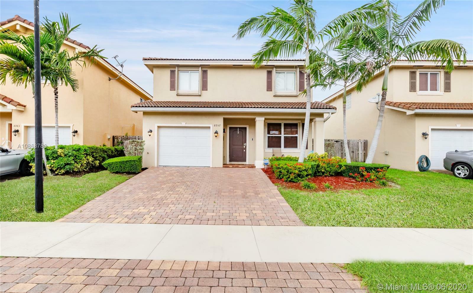 Property Photo:  8957 SW 215th Ln  FL 33189 