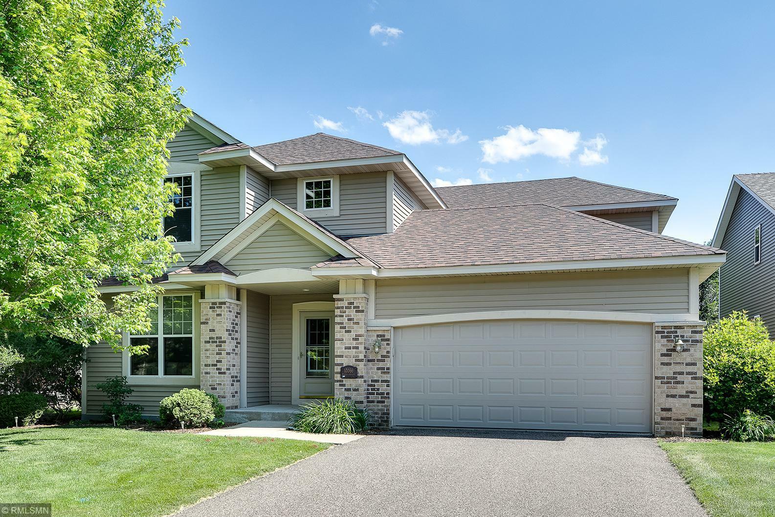 Property Photo:  10066 Toledo Drive N  MN 55443 