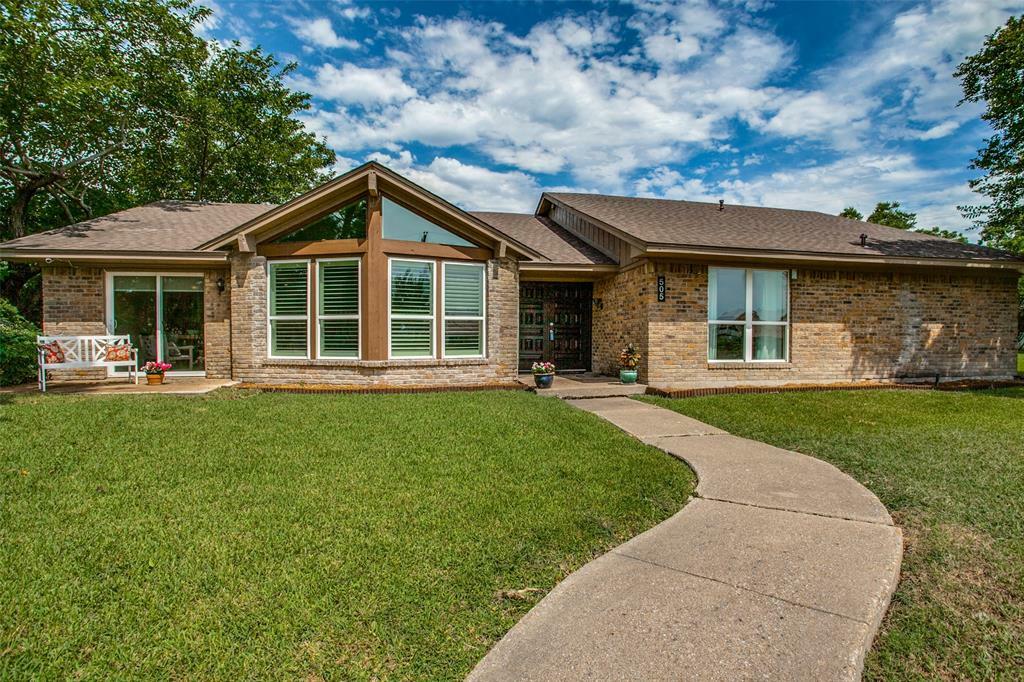 Property Photo: 505 Point Royal Drive TX 75087
