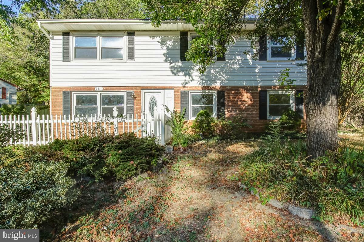 Property Photo:  3401 Village Drive N  MD 20772 