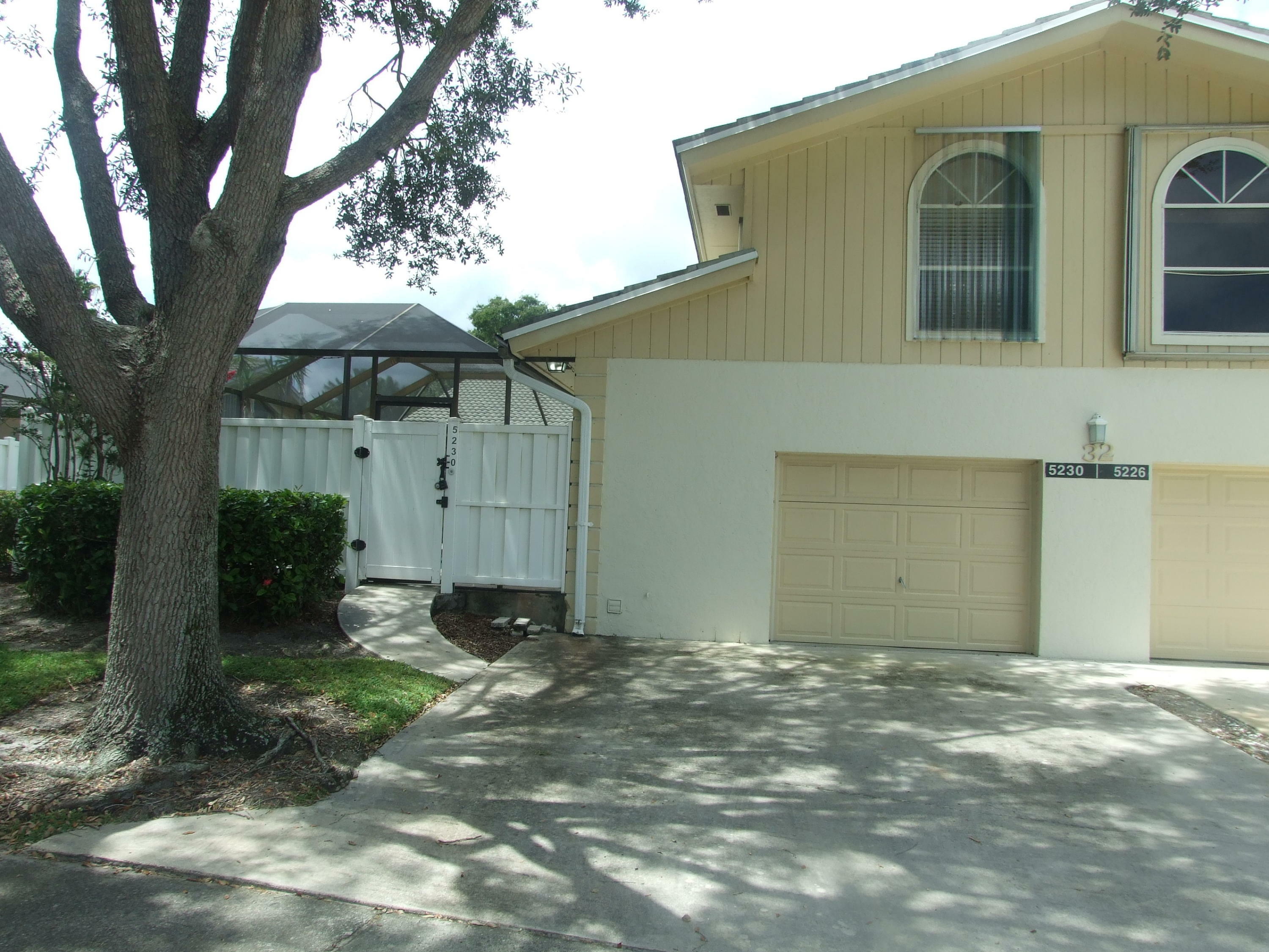 Property Photo:  5230 Woodruff Lane  FL 33418 