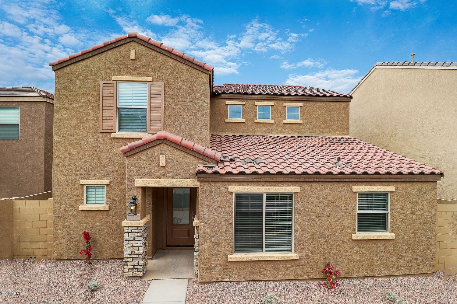 Property Photo:  8057 W Albeniz Place  AZ 85043 