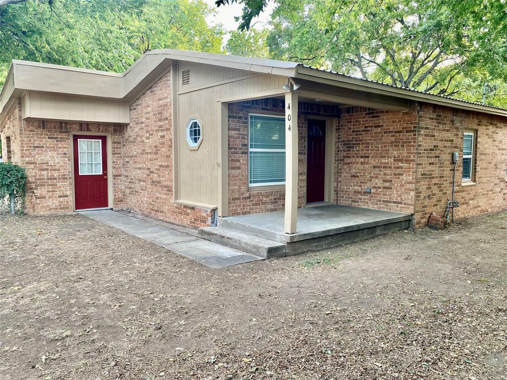 Property Photo:  404 N Hannaford Street  TX 76048 