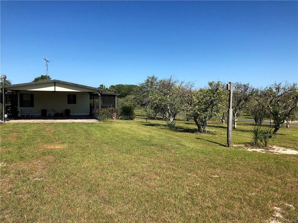 Property Photo:  5540 W Grovepark Road  FL 34433 