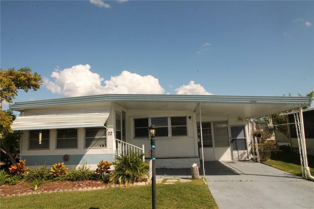 Property Photo:  1401 W Highway 50 22  FL 34711 