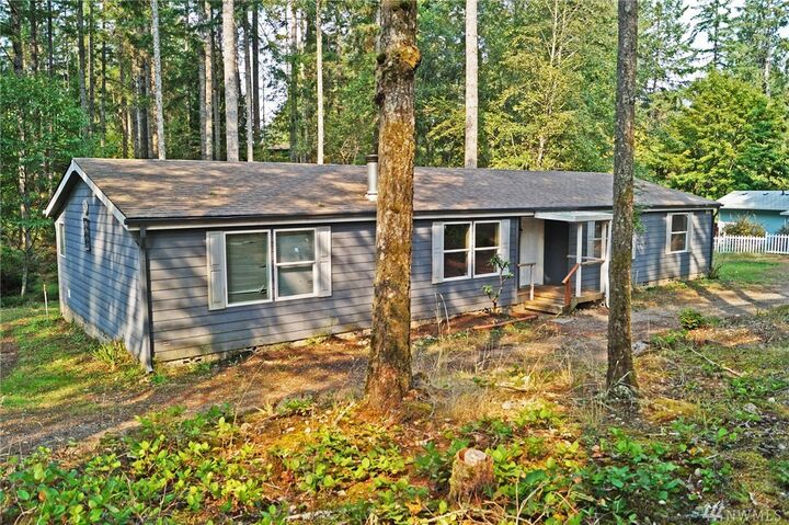 Property Photo: 511 E Timberlakes Dr E WA 98584