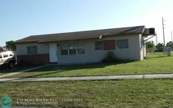 Property Photo:  1370 SW 6th Ave  FL 33441 