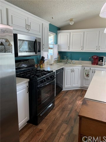 Property Photo: 140 W Pioneer Avenue 18 CA 92374