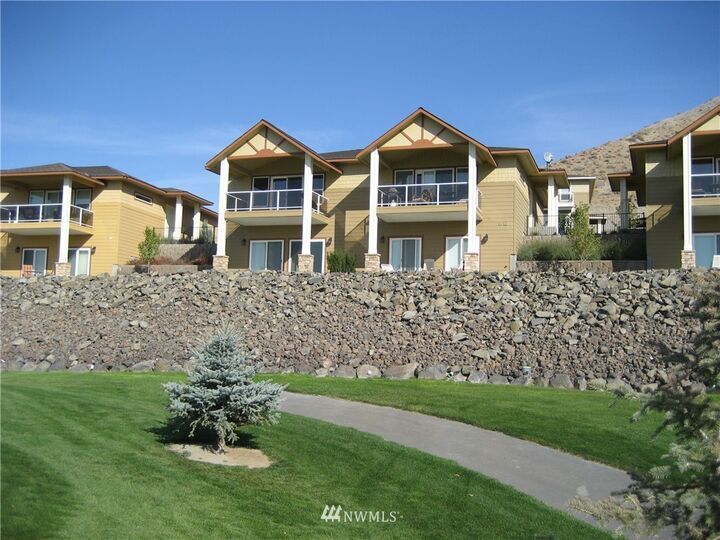 Property Photo:  23224 Sunserra Loop NW B8  WA 98848 