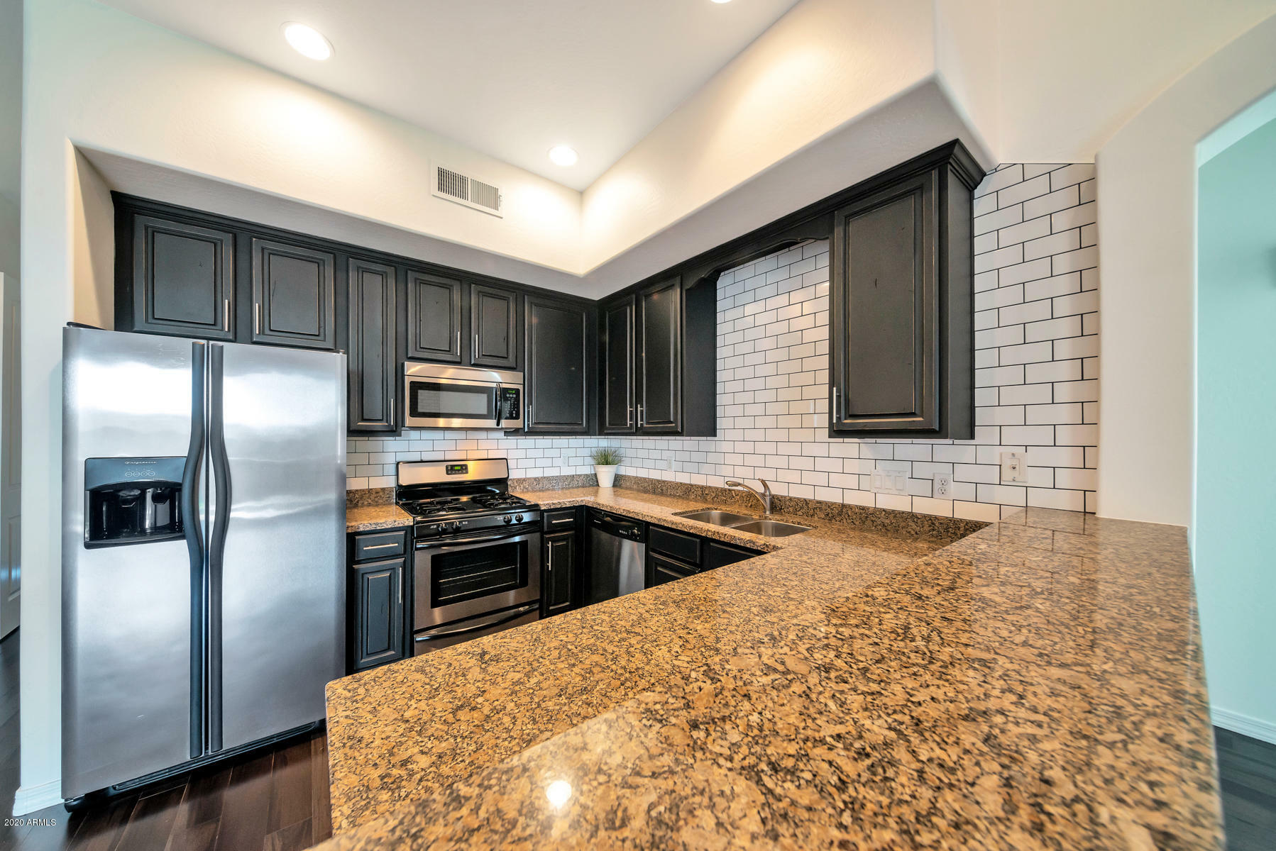 Property Photo: 5998 N 78th Street 2003 AZ 85250