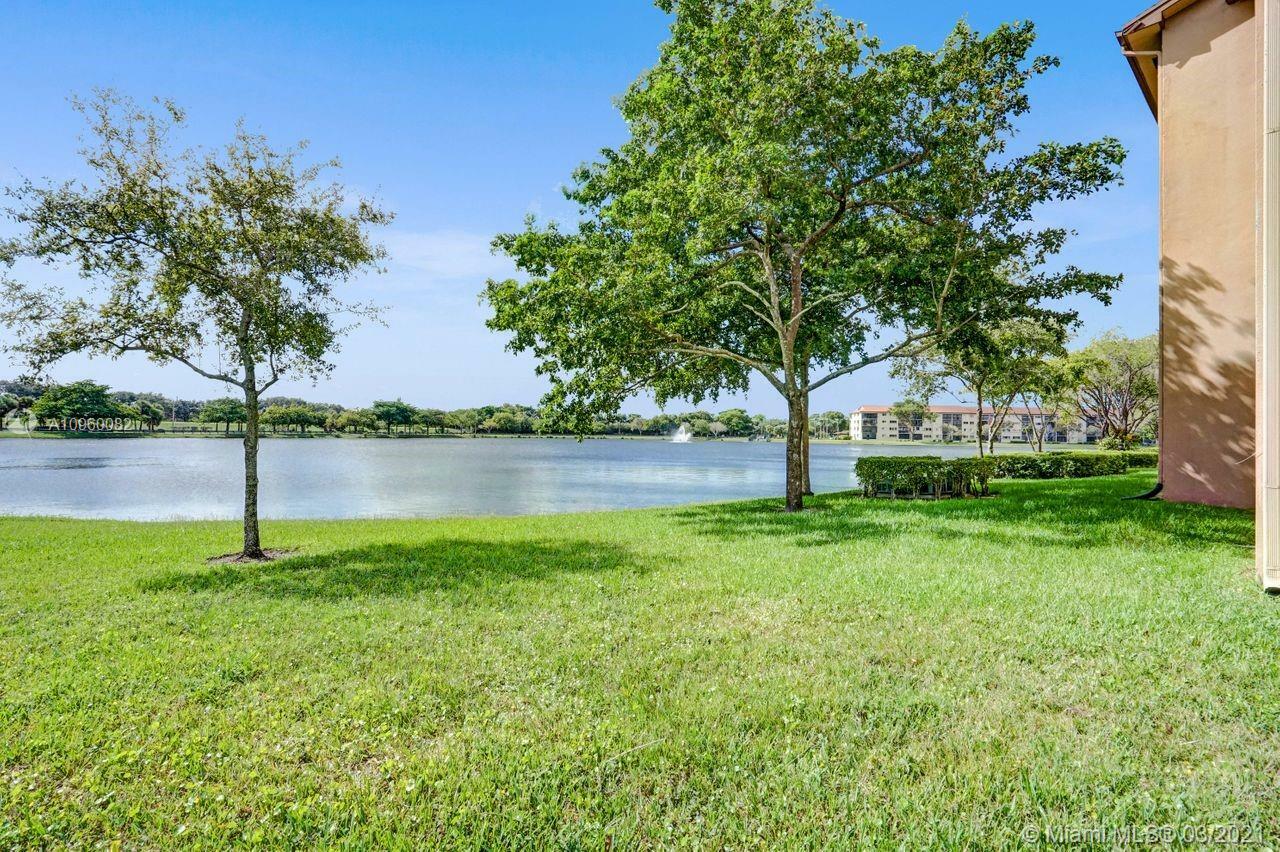 Property Photo:  13700 SW 14th St 208D  FL 33027 