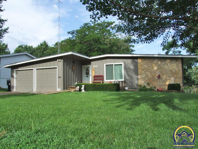 Property Photo:  3113 SW Stone Ave  KS 66614 