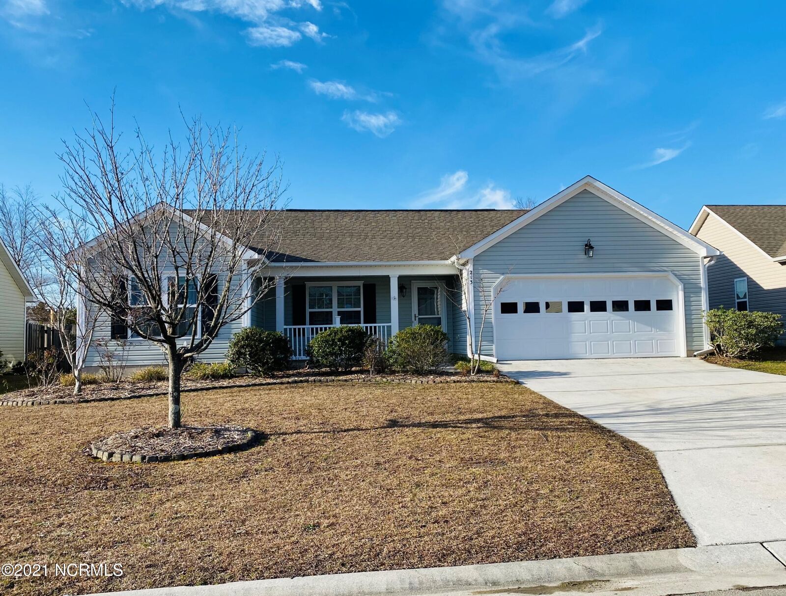 Property Photo:  213 Red Carnation Drive  NC 28445 