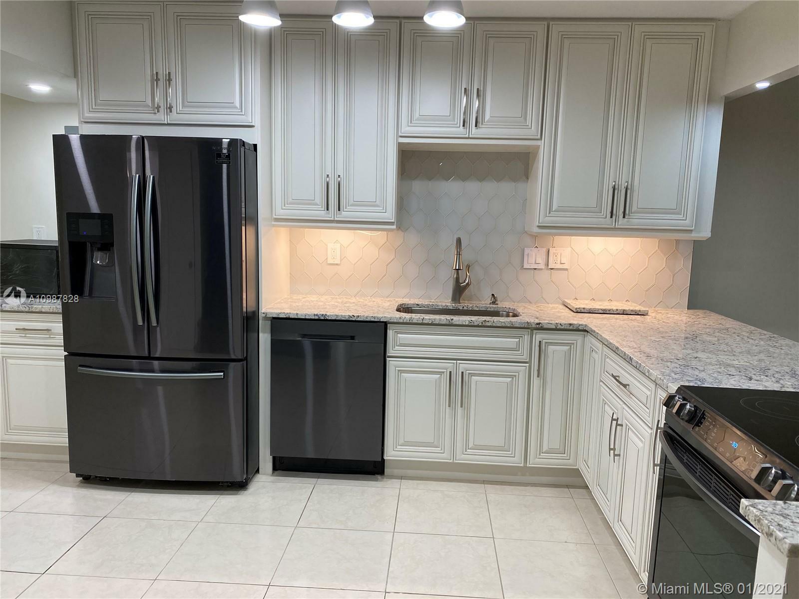 Property Photo: 20300 W Country Club Dr 115-3 FL 33180