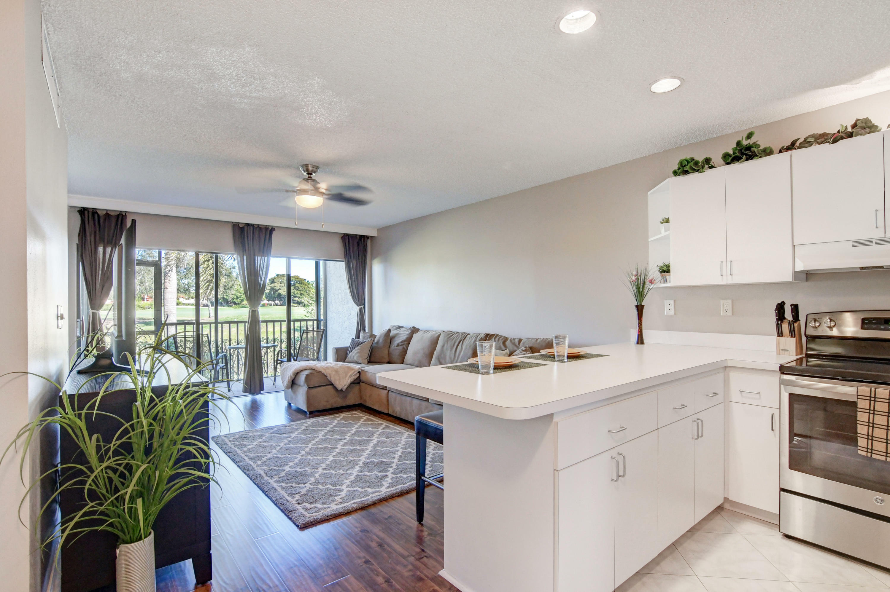 Property Photo: 401 Greensward Lane 102-A FL 33445