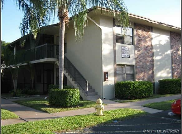 Property Photo:  10025 Winding Lake Rd 202  FL 33351 