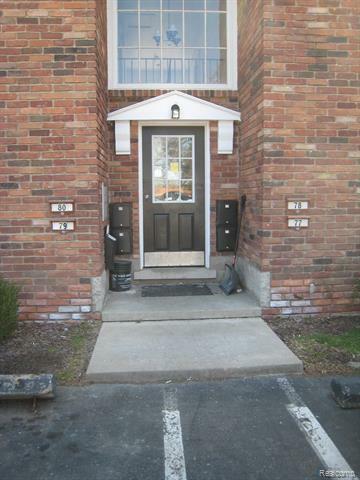 Property Photo:  31831 Grand River Ave Unit 79  MI 48336 